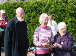 John and Judeth Lycett being presented with their award by Mrs Rotheram.